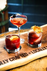 Three Durham Distillery Negroni's from "The Art of the Negroni" cocktail class.
