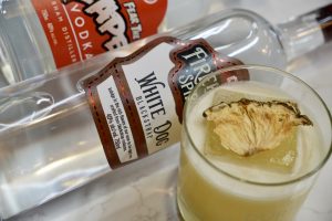 A twist on the Pina Picante made with Dont Fear the Reaper Vodka and White Dog Blackstrap, garnished with a dehydrated pineapple.
